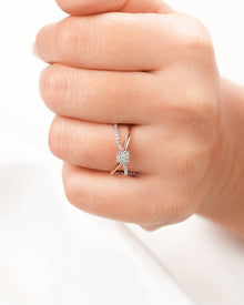 Round lab grown diamond split-shank ring worn on hand in rose gold