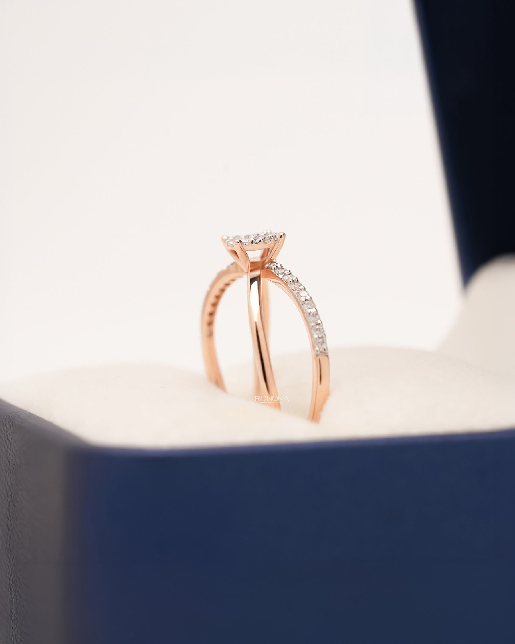 Side profile of round lab grown diamond split-shank ring showing split pavé setting