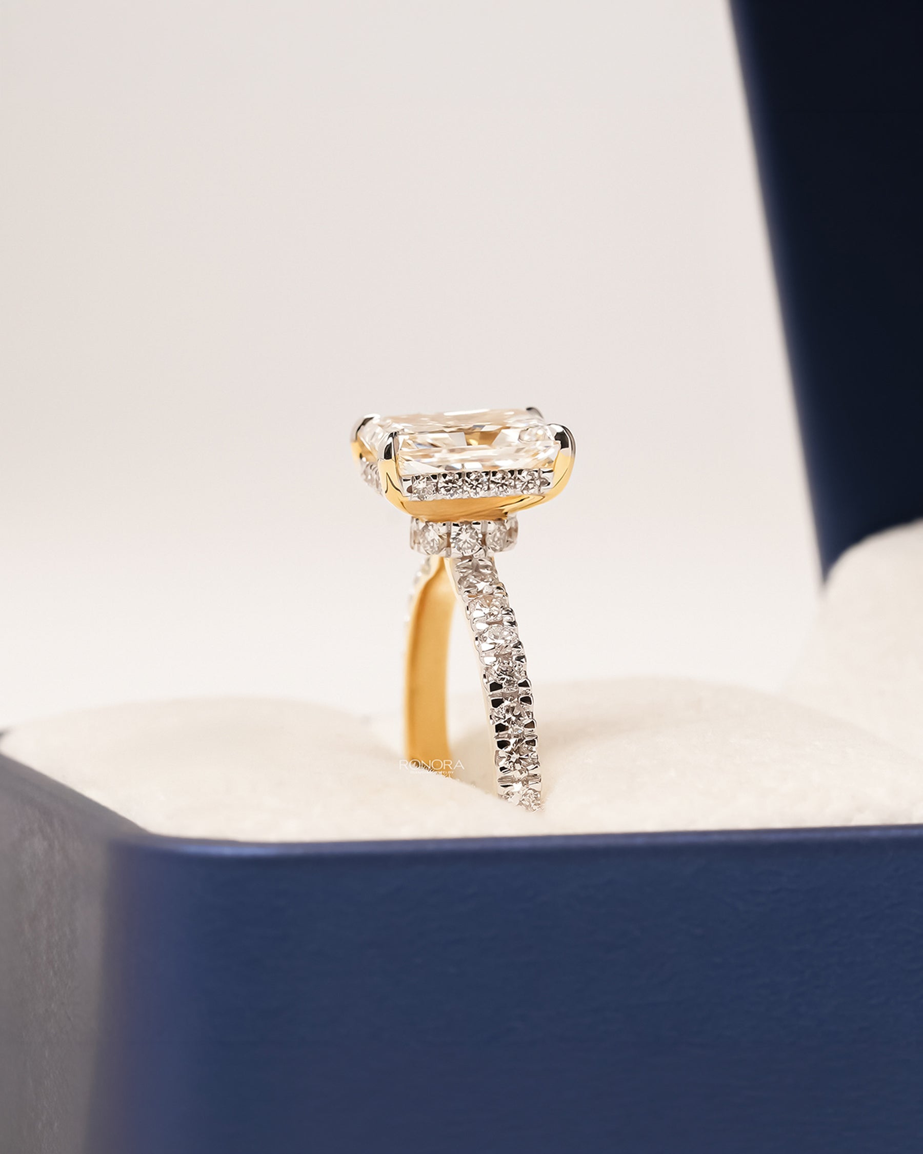 Side profile of radiant lab grown diamond pavé ring showing pavé setting