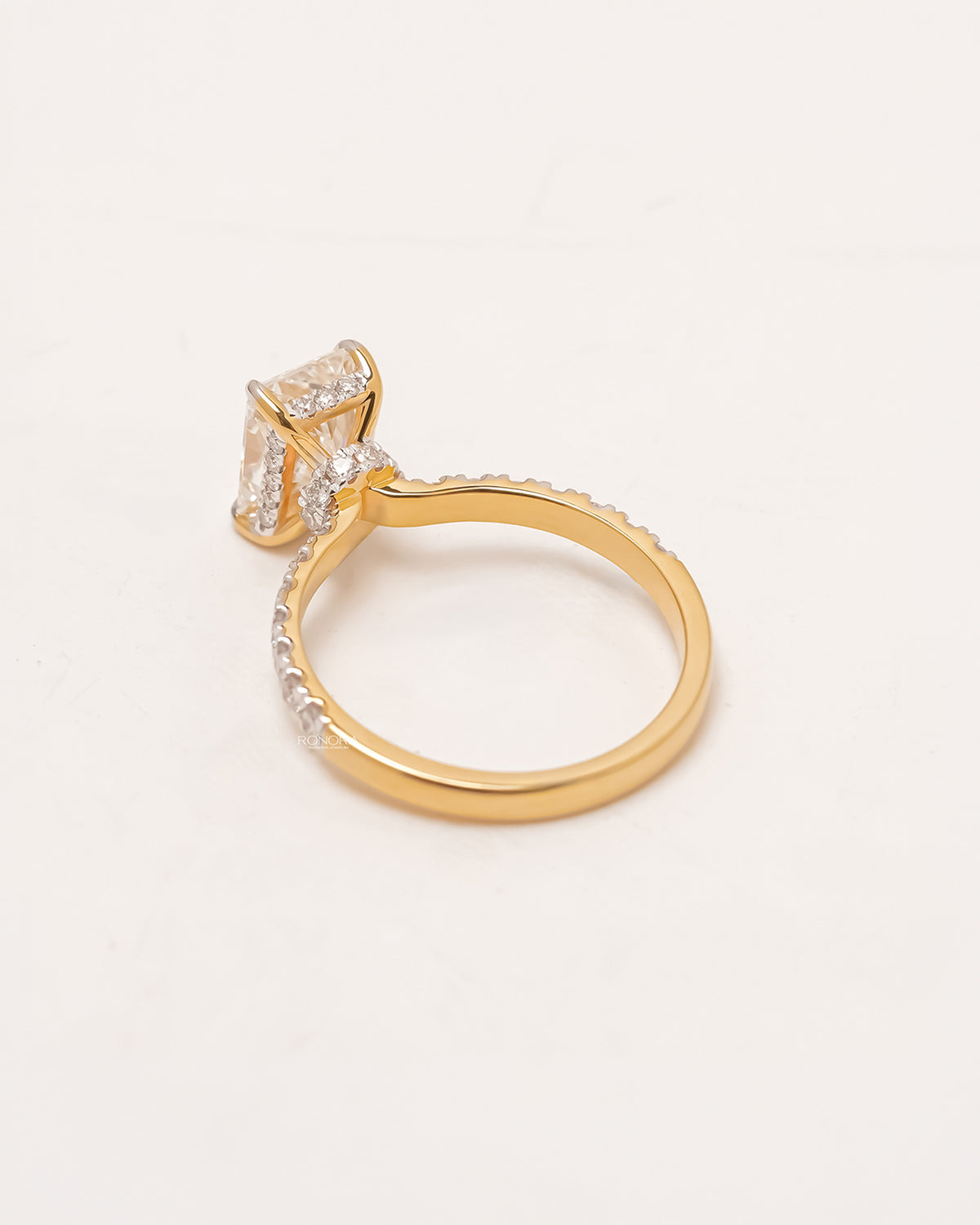 Back view of radiant lab grown diamond pavé ring showing band and gallery detail