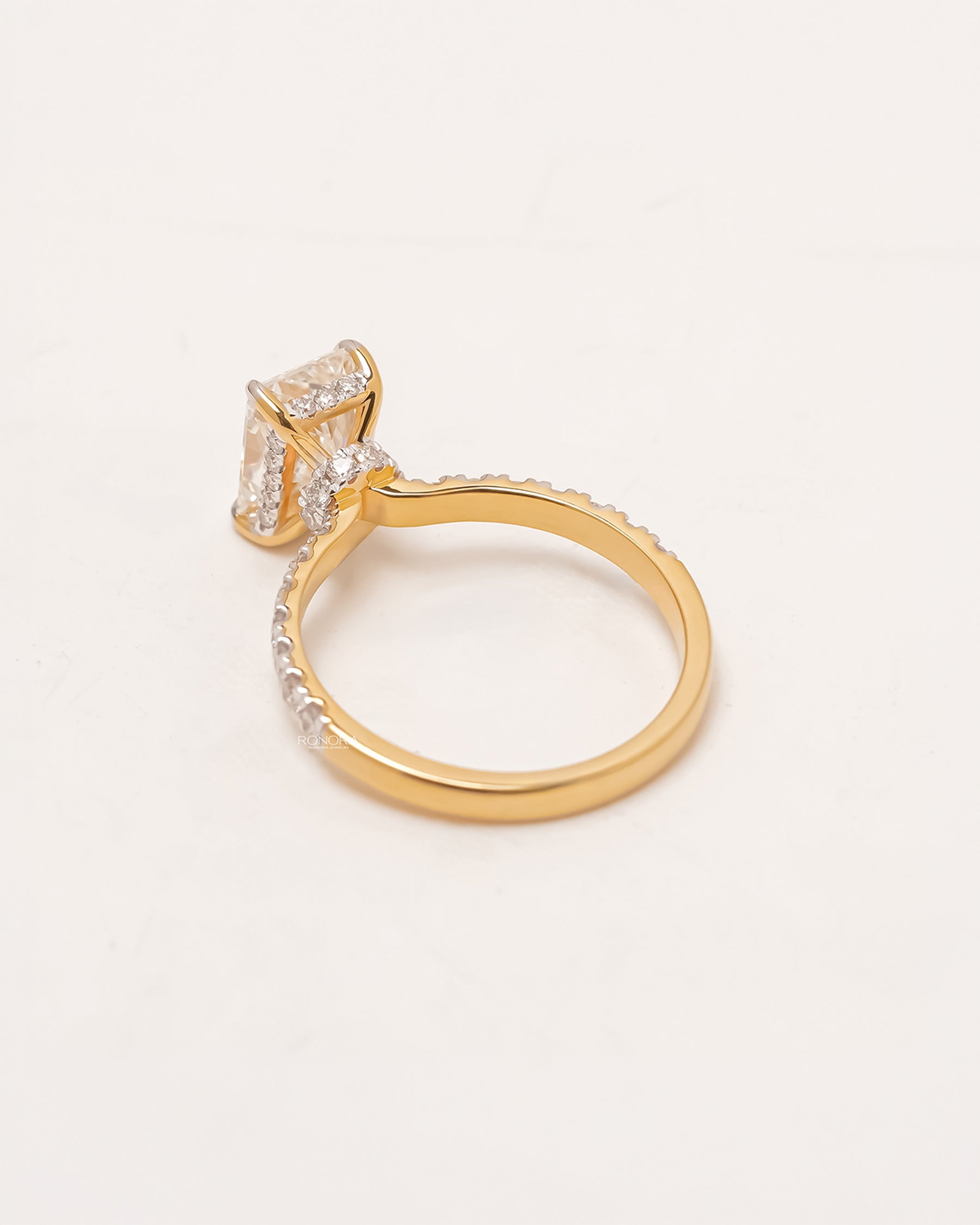 Back view of radiant lab grown diamond pavé ring showing band and gallery detail