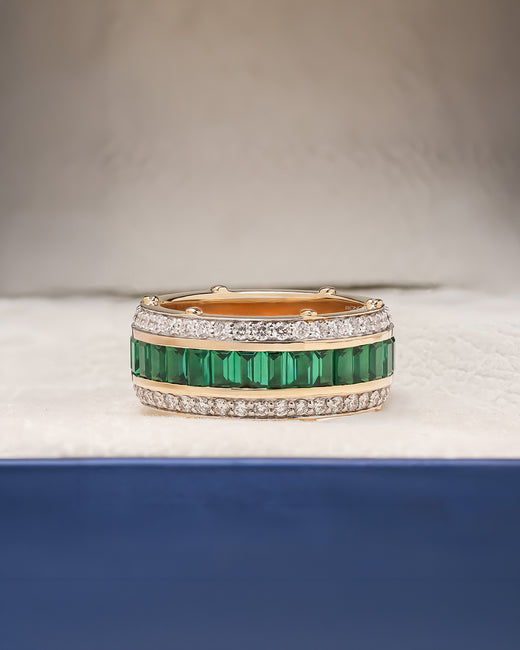 Emerelle green lab grown diamond channel band in yellow gold inside Ronora box