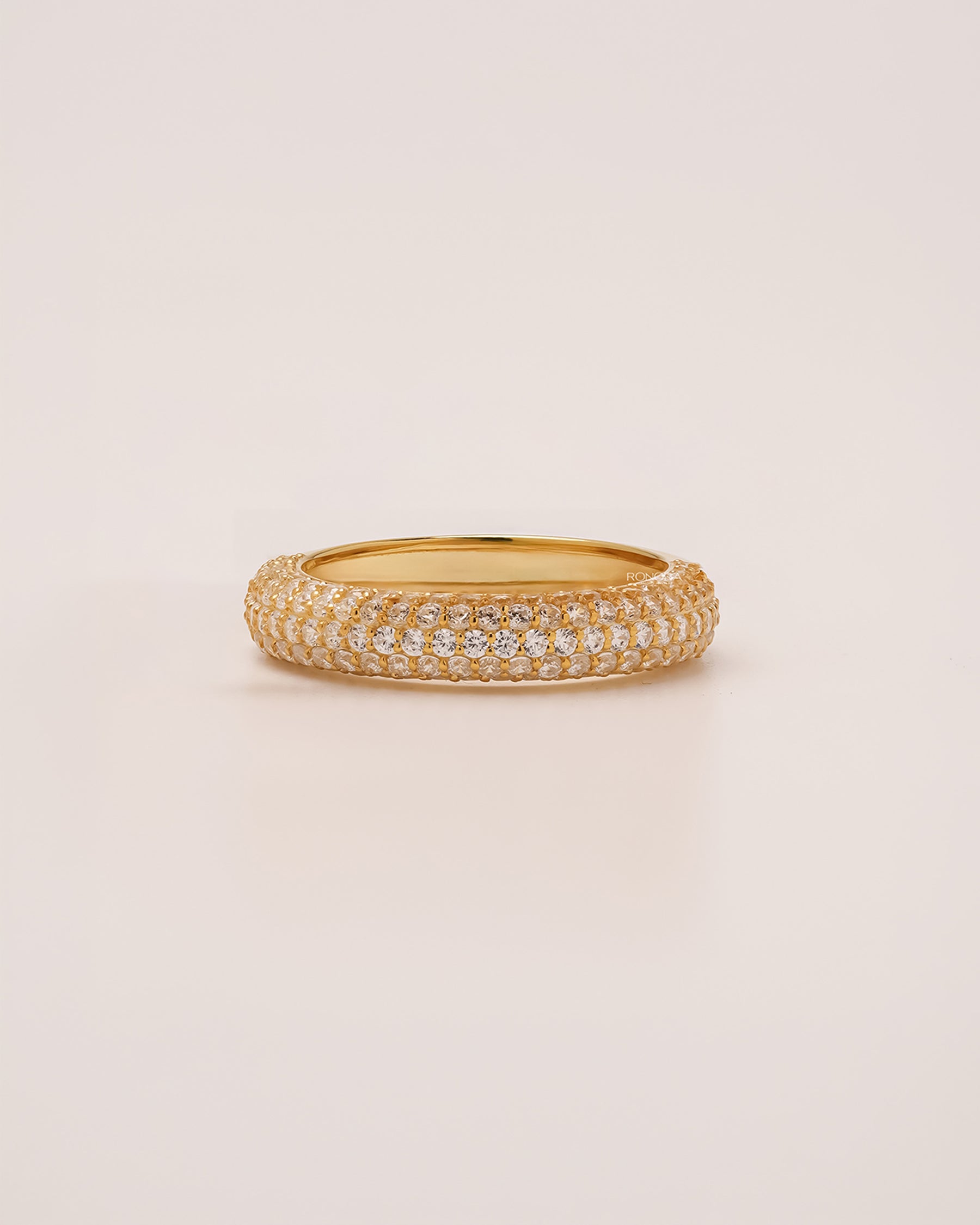 Valence wide lab grown diamond pavé band in yellow gold inside Ronora box