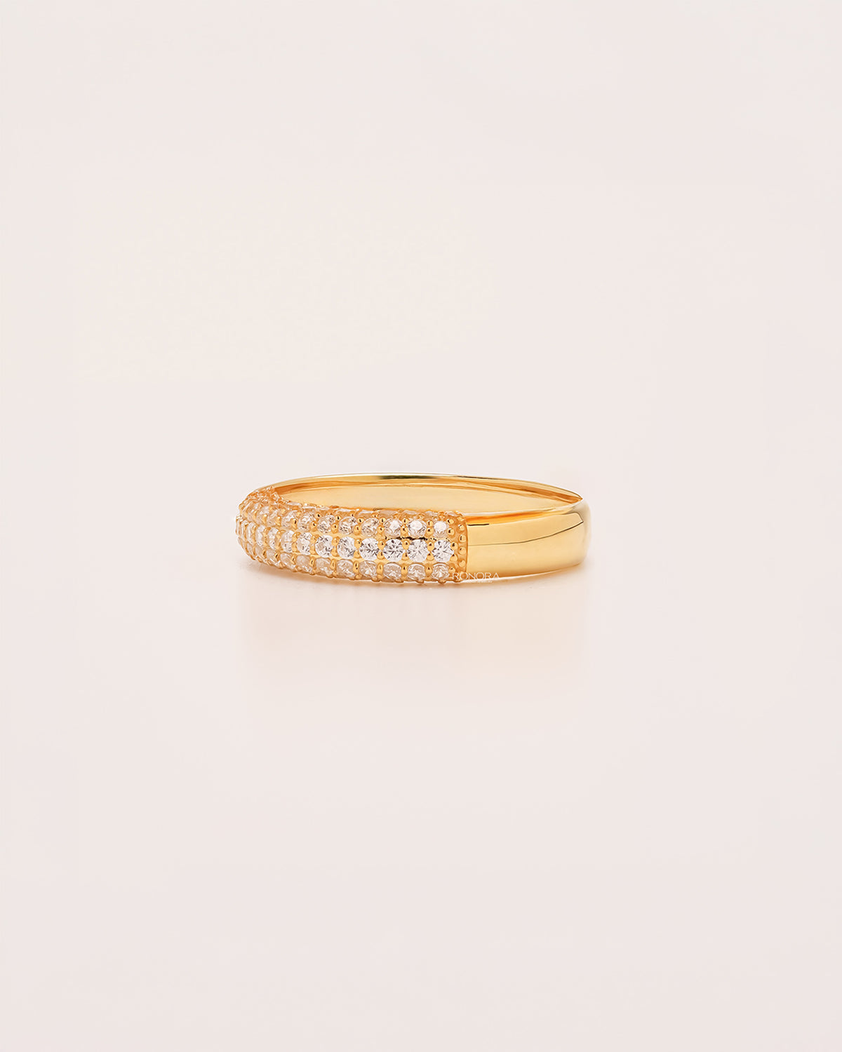 Side profile of wide lab grown diamond pavé band showing multi-row pavé setting