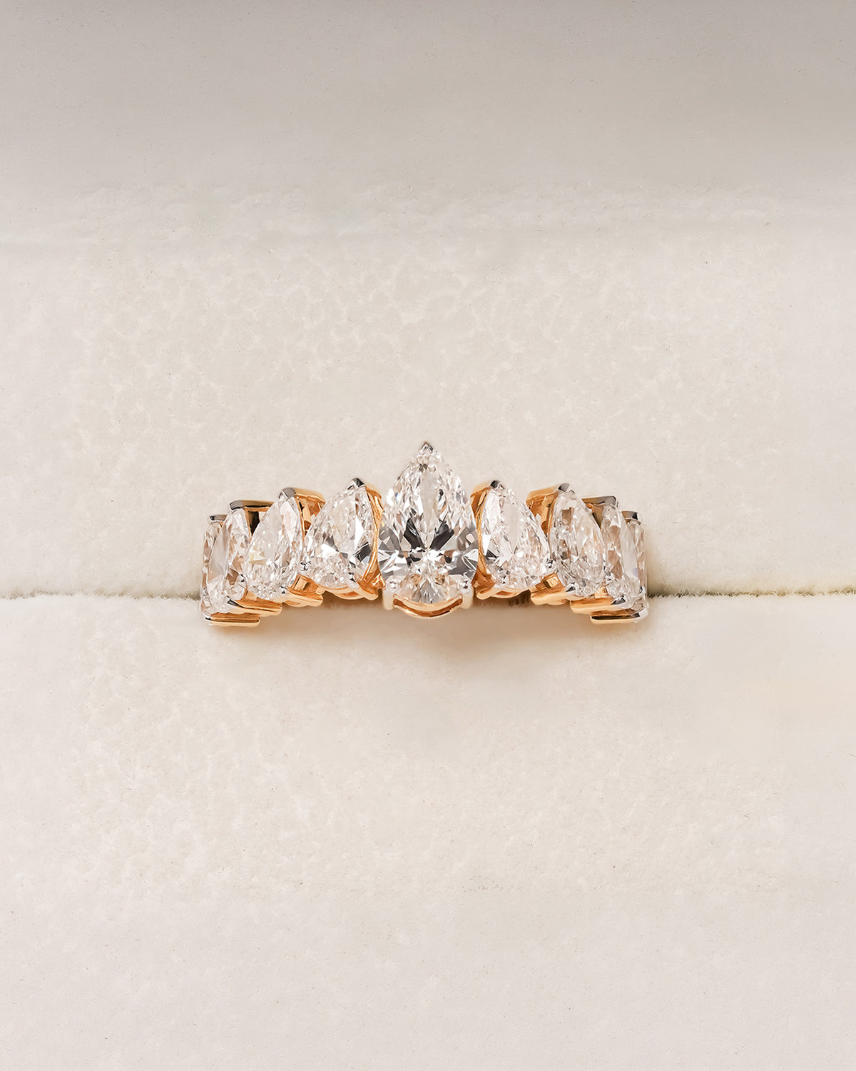 Amelie pear lab grown diamond five-stone band in yellow gold inside Ronora box