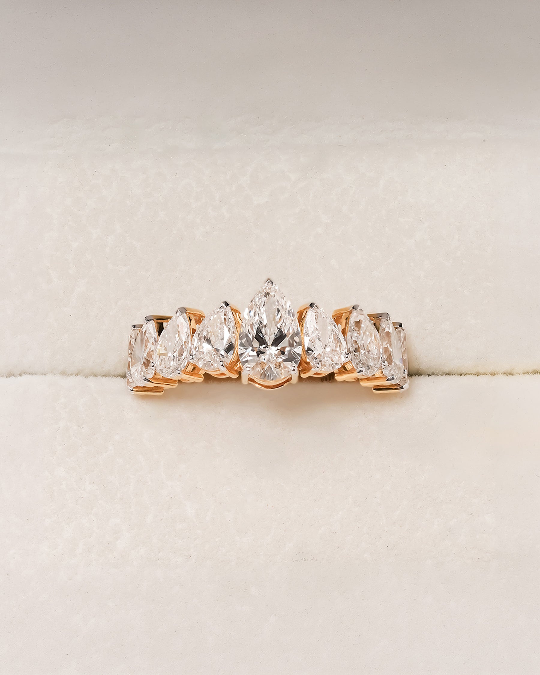 Amelie pear lab grown diamond five-stone band in yellow gold inside Ronora box