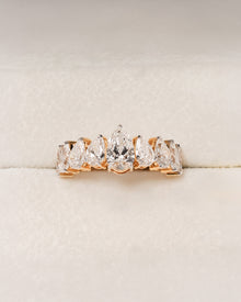 Amelie pear lab grown diamond five-stone band in yellow gold inside Ronora box