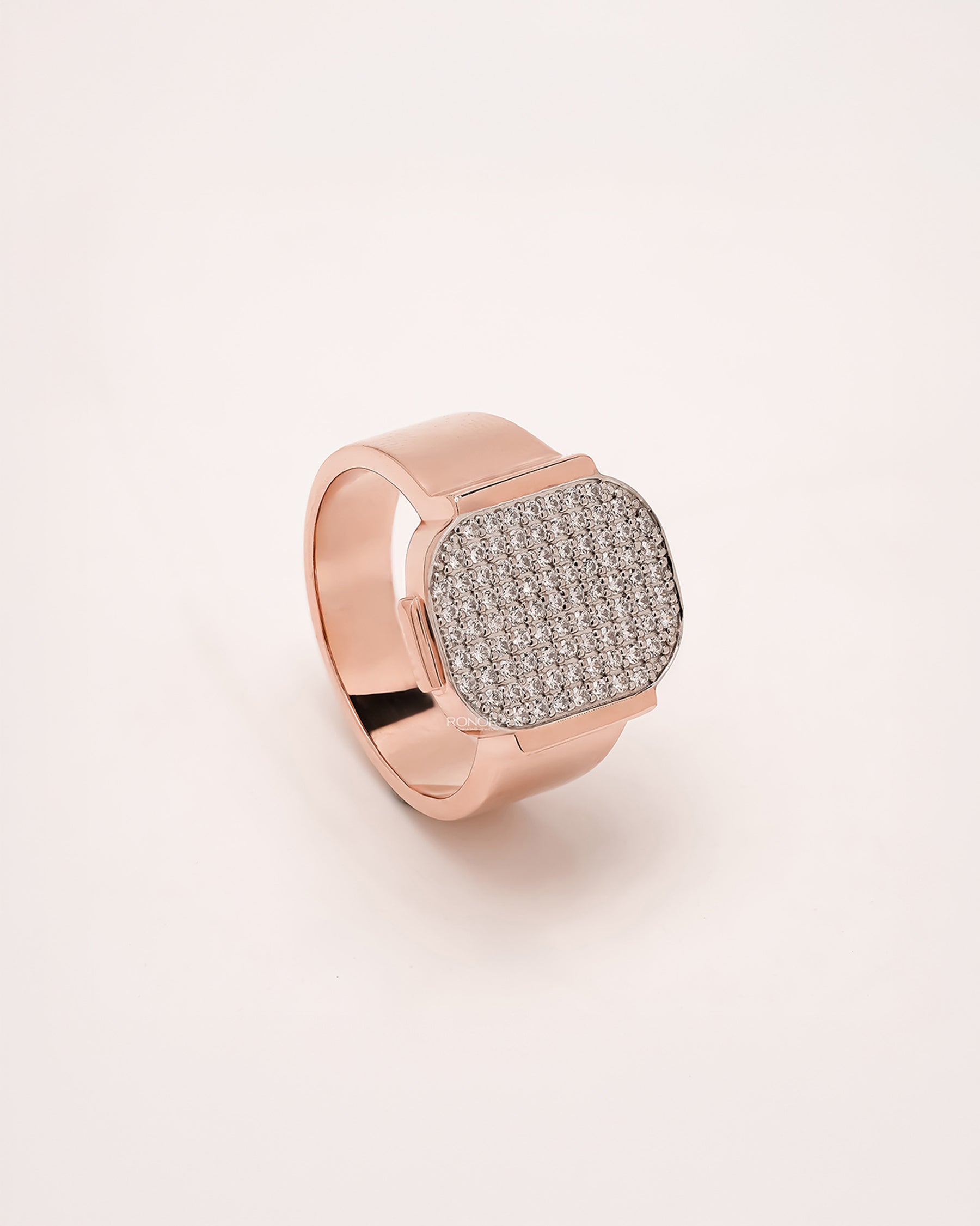 Side profile of square lab grown diamond pavé signet ring showing pavé signet setting