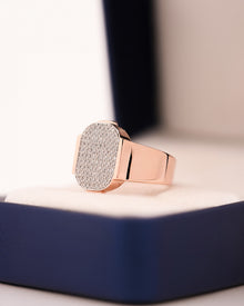 Angled view of square lab grown diamond pavé signet ring showing pavé signet setting