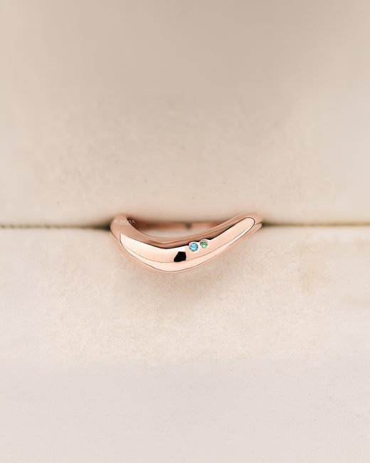 Lyra blue accent lab grown diamond curved ring in rose gold inside Ronora box
