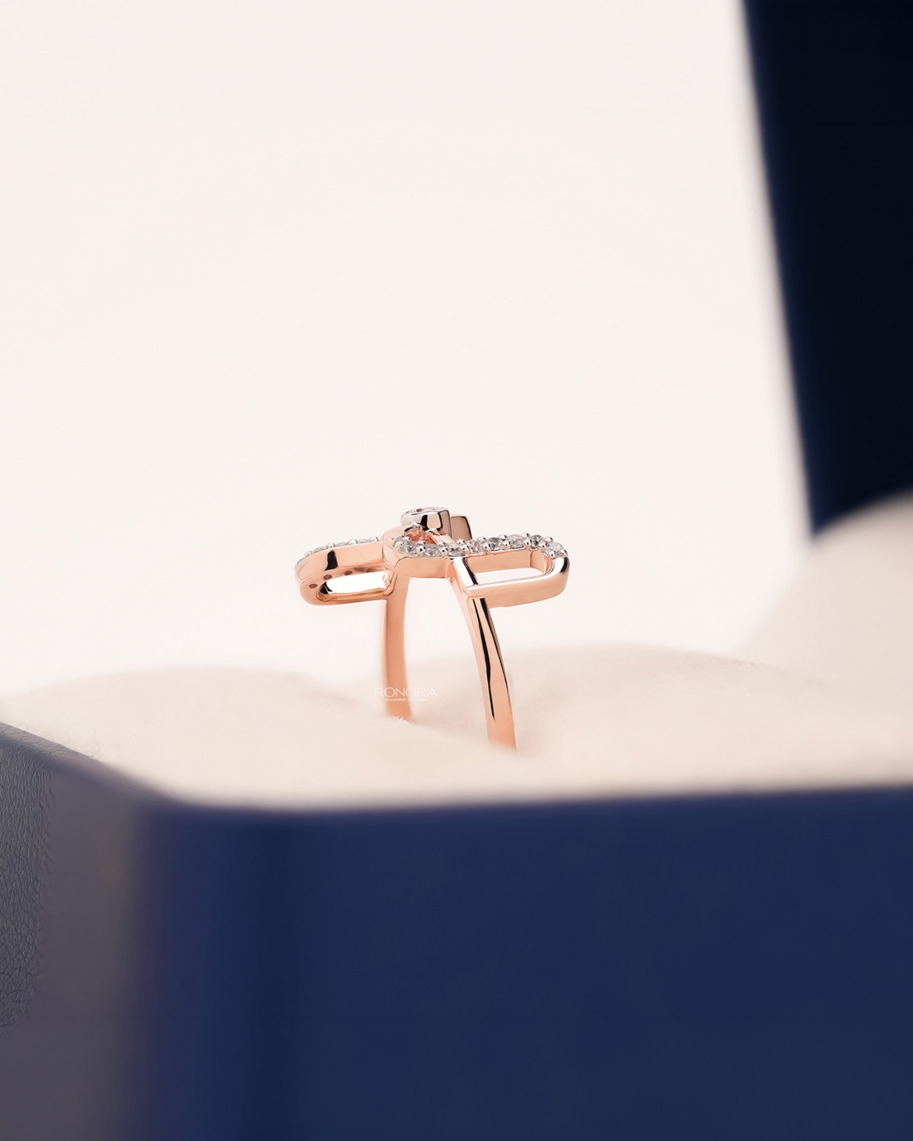 Side profile of open lab grown diamond geometric ring showing open two-stone setting