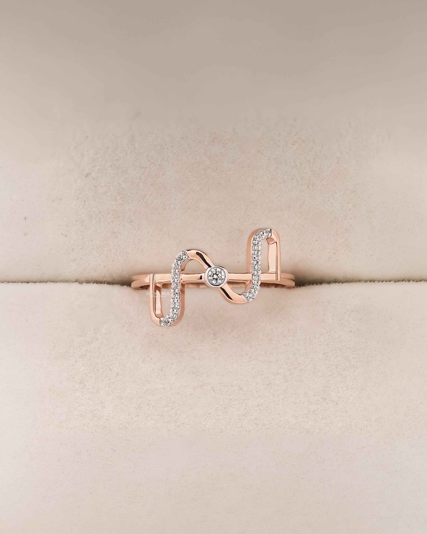 Angled view of open lab grown diamond geometric ring showing open two-stone setting