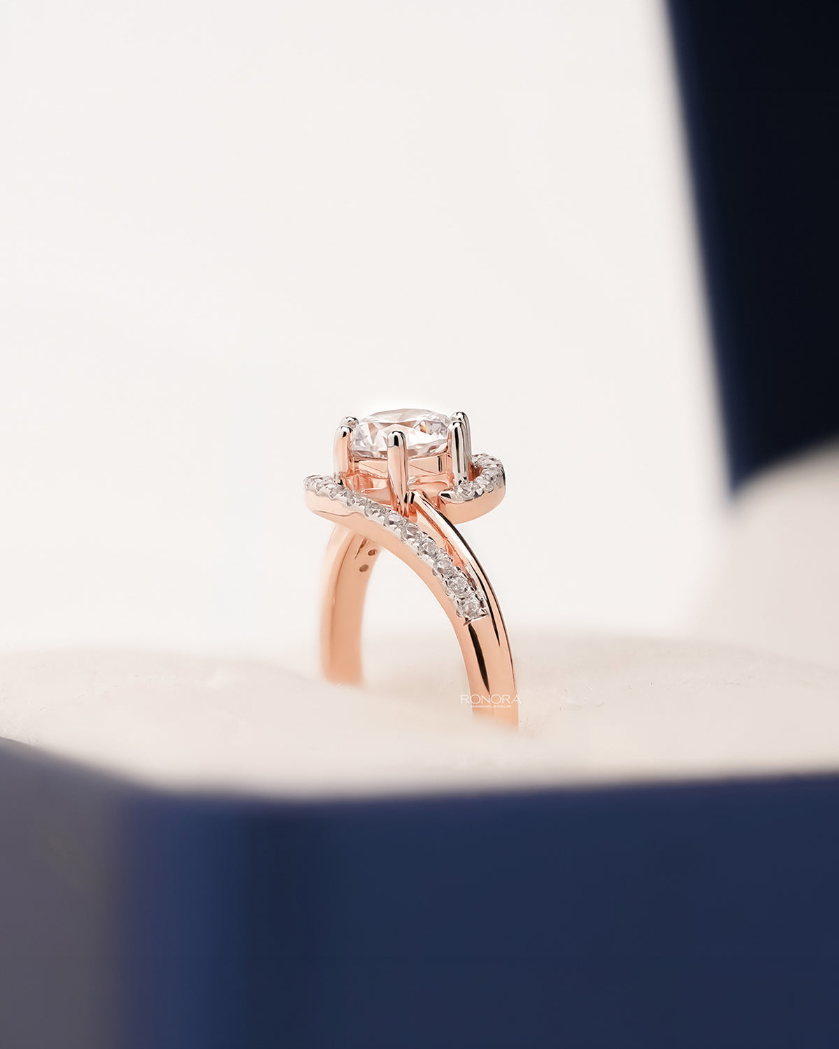 Side profile of round lab grown diamond twisted pavé ring showing twisted pavé setting