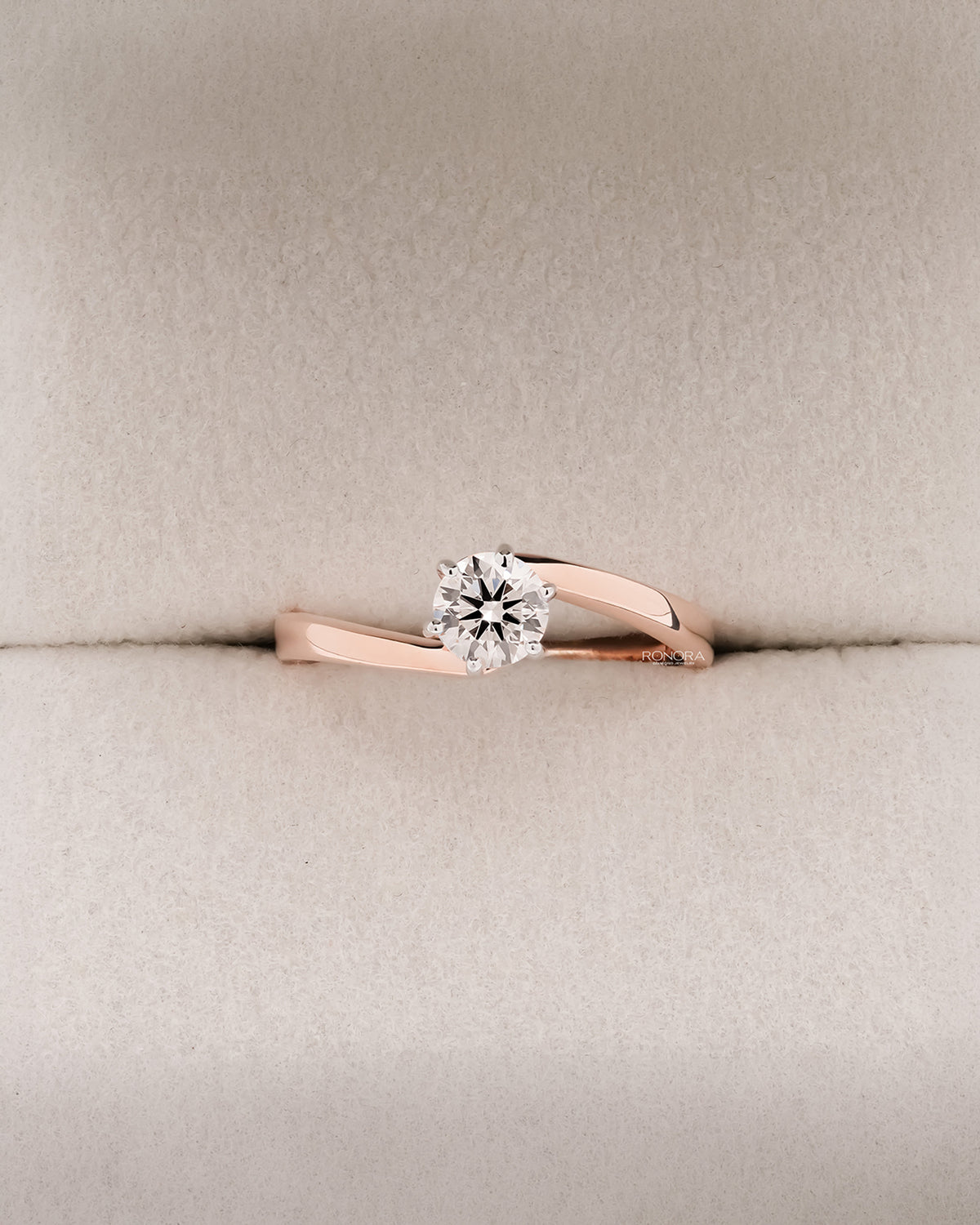 Ariane round lab grown diamond bypass ring in rose gold inside Ronora box