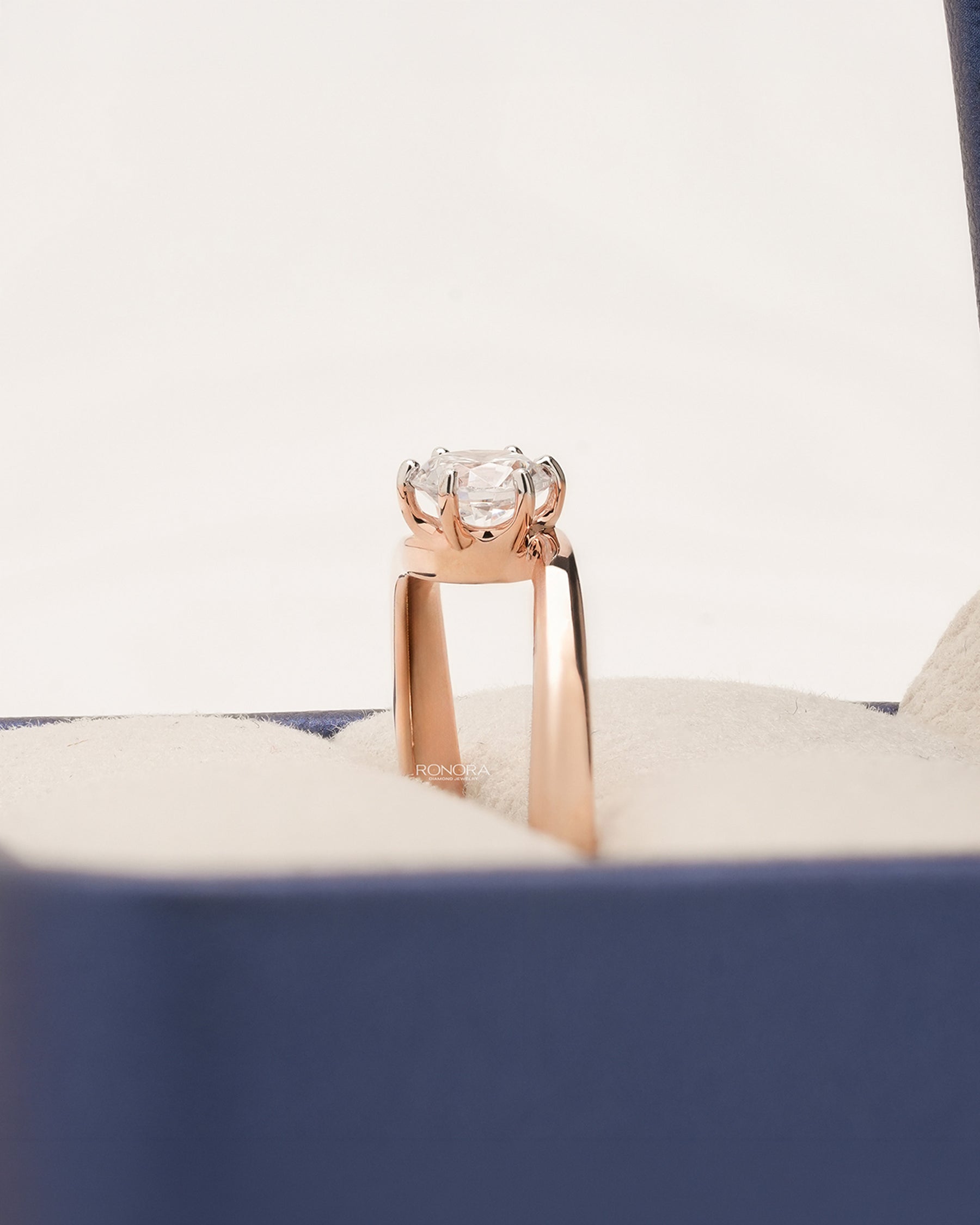 Side profile of round lab grown diamond bypass ring showing bypass setting