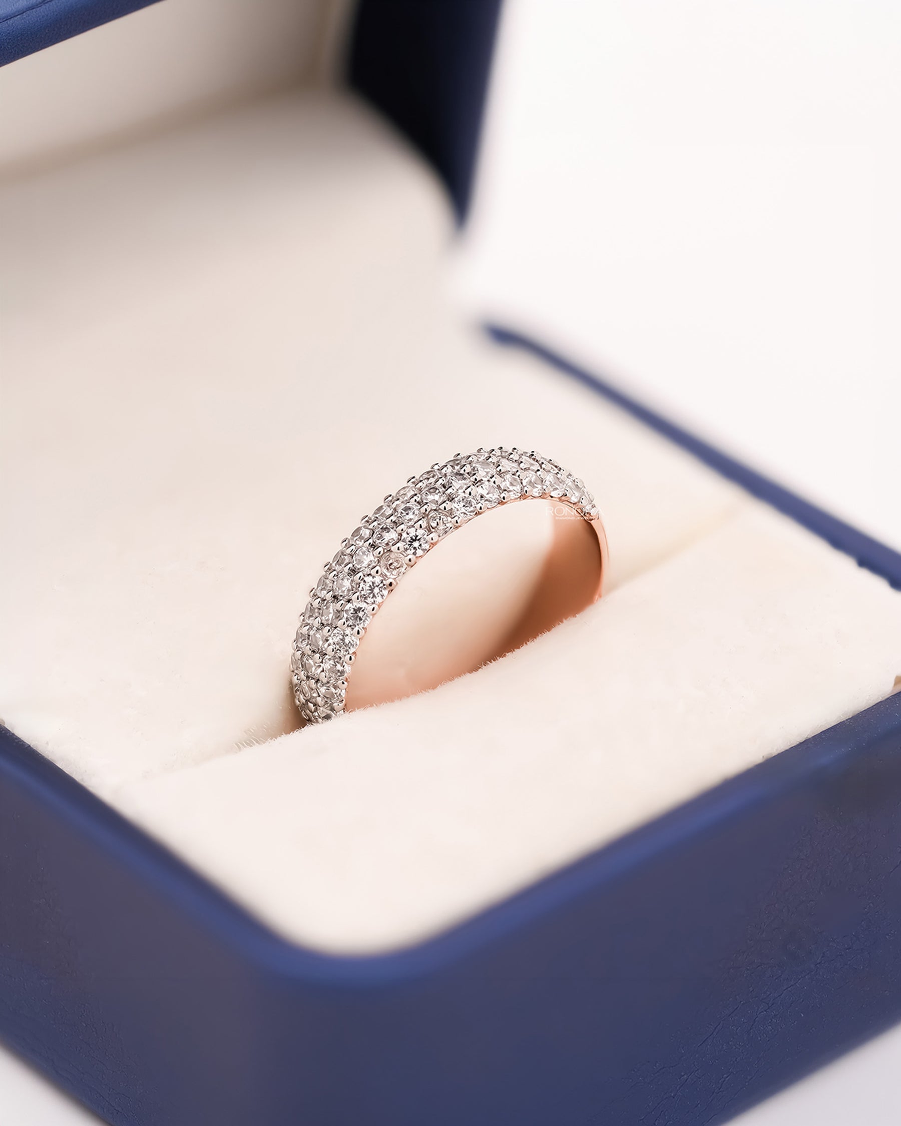 Estelle wide lab grown diamond pavé band in rose gold inside Ronora box