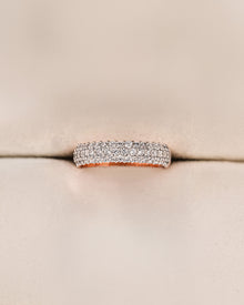 Angled view of wide lab grown diamond pavé band showing multi-row pavé setting