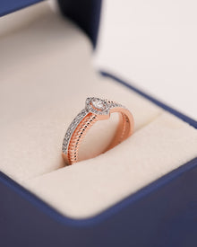 Angled view of marquise lab grown diamond double pavé ring showing double pavé setting