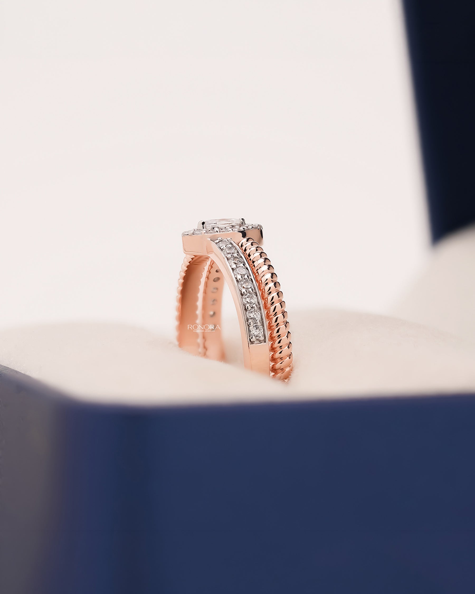 Side profile of marquise lab grown diamond double pavé ring showing double pavé setting