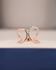 Seren open lab grown diamond swirl ring in rose gold inside Ronora box