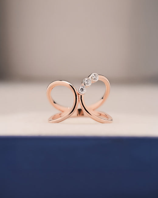 Seren open lab grown diamond swirl ring in rose gold inside Ronora box
