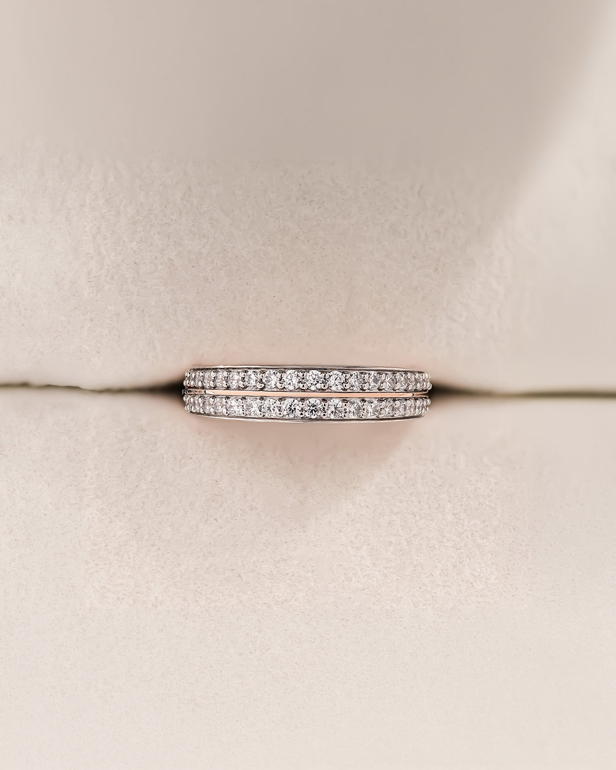 Angled view of double-row lab grown diamond pavé band showing pavé setting