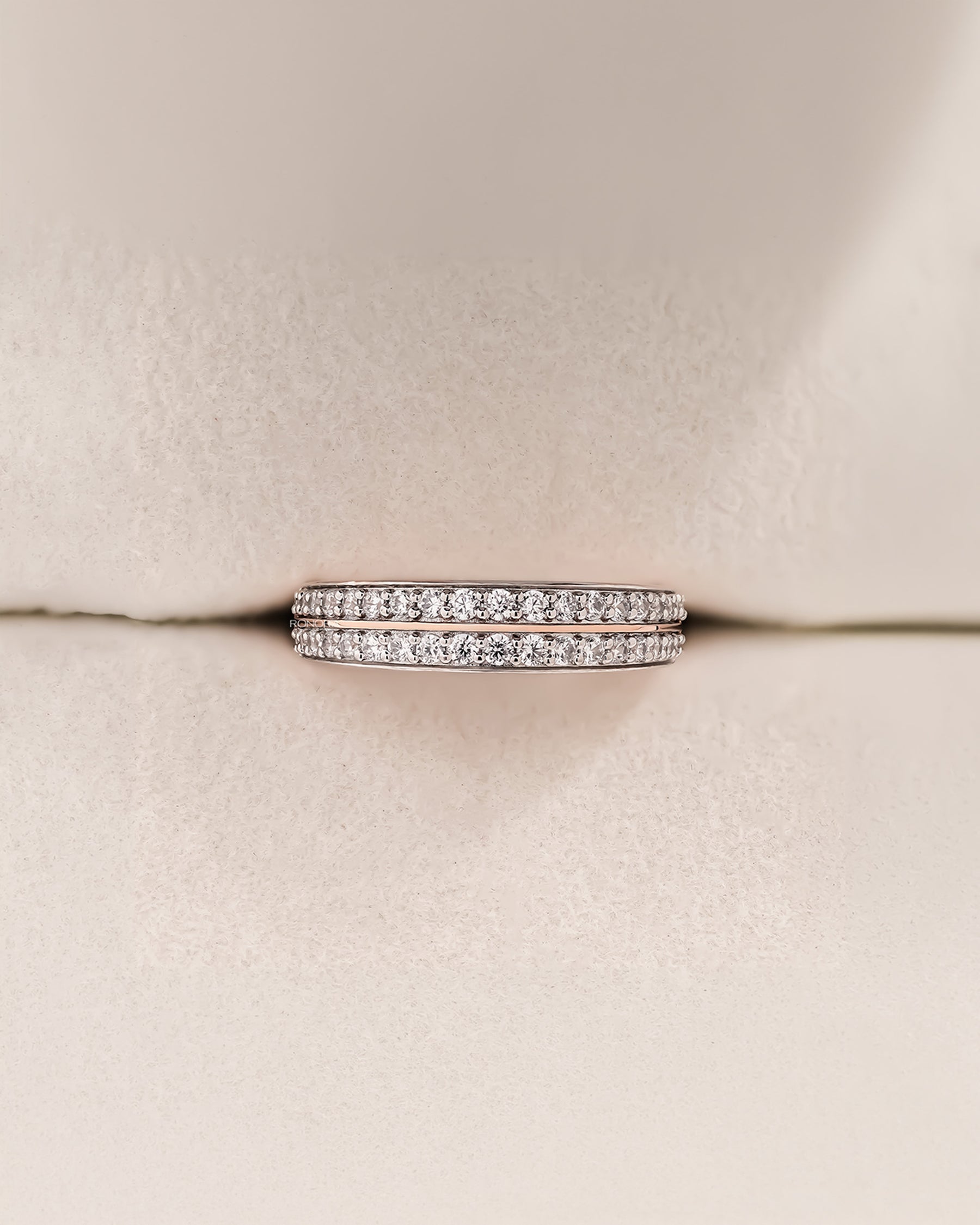 Angled view of double-row lab grown diamond pavé band showing pavé setting