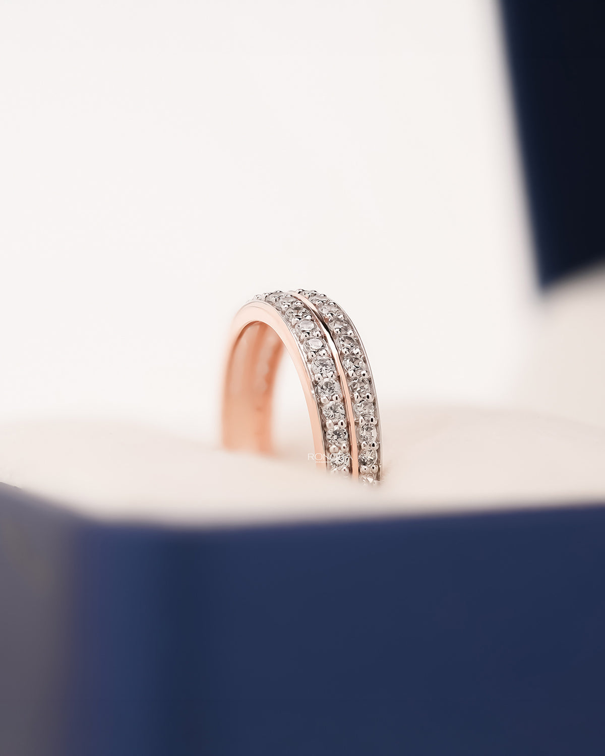 Side profile of double-row lab grown diamond pavé band showing pavé setting