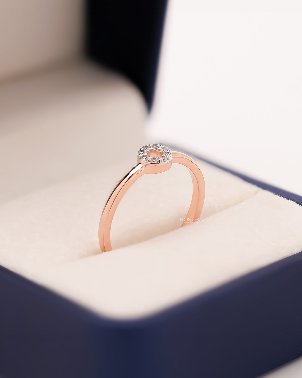Mirabelle round lab grown diamond halo ring in rose gold inside Ronora box