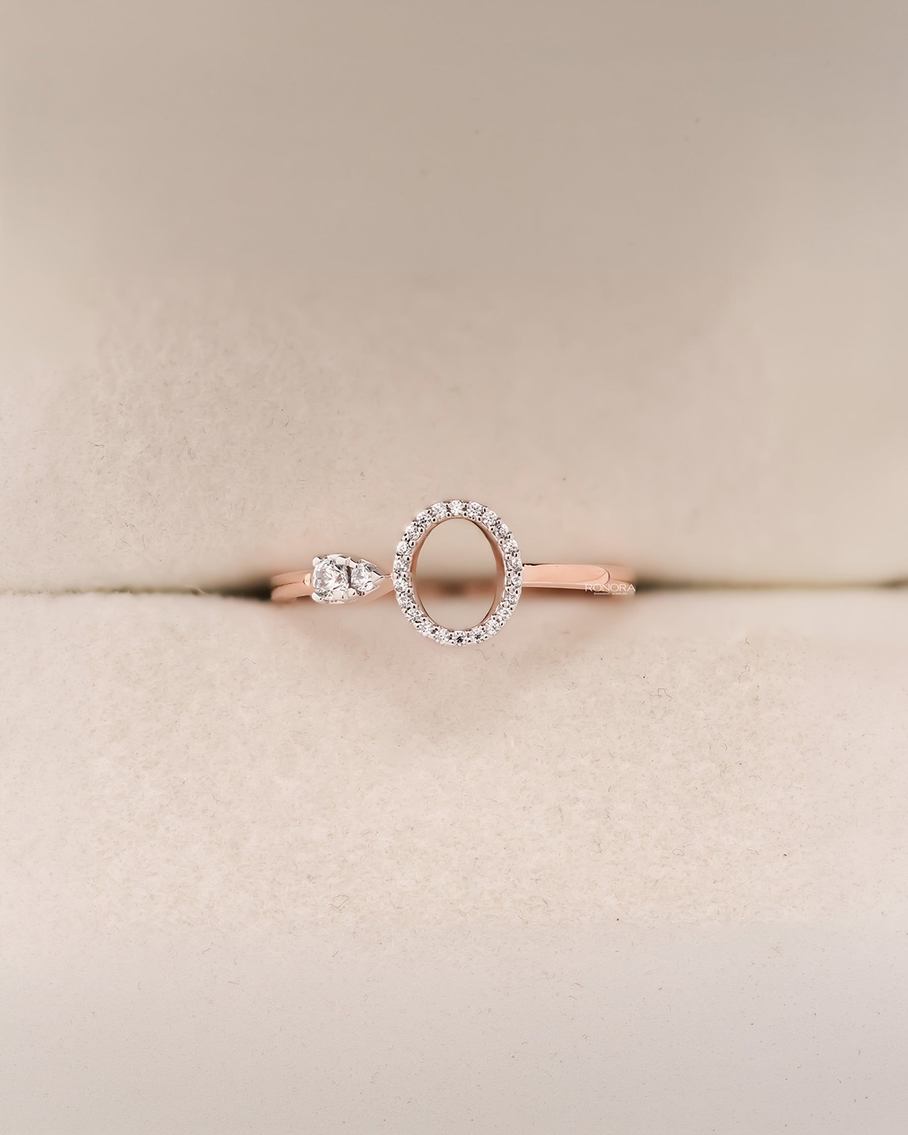 Front view of round lab grown diamond open halo ring with airy circle detail