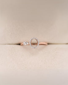Front view of round lab grown diamond open halo ring with airy circle detail