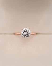 Clarisse round moissanite solitaire ring in rose gold front view