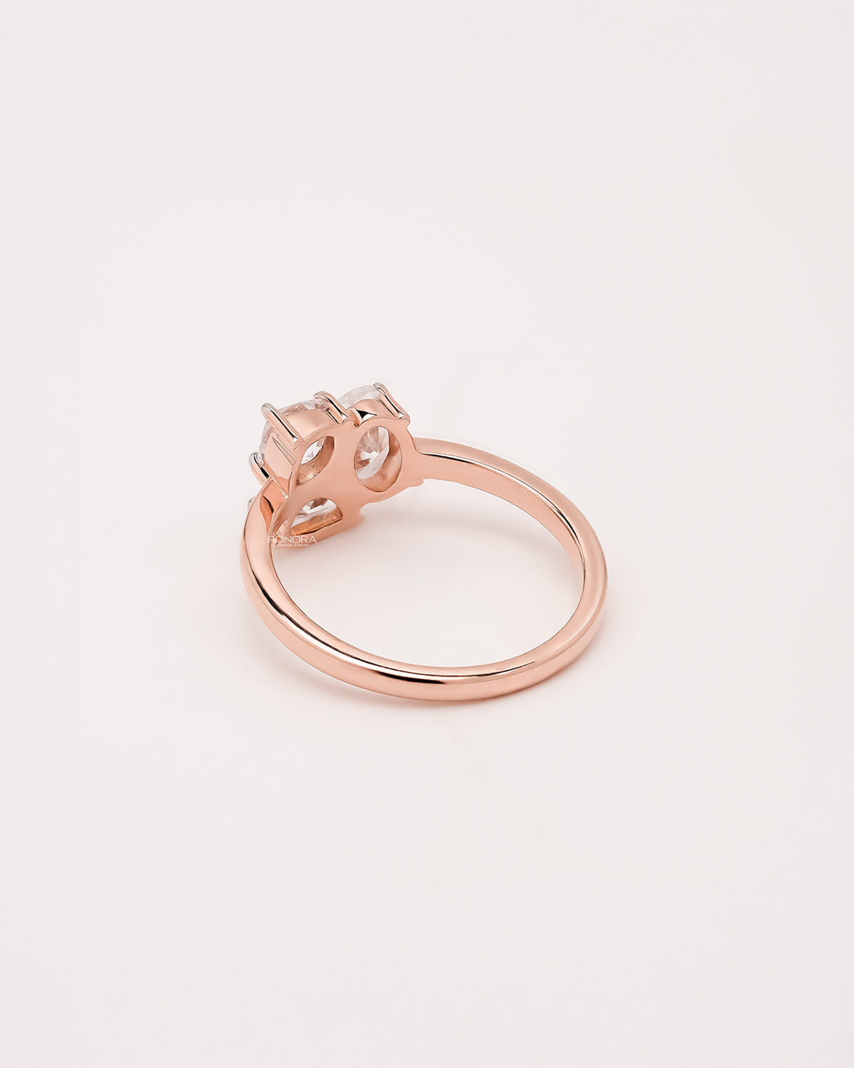 Back view of oval lab grown diamond cluster ring showing band detail