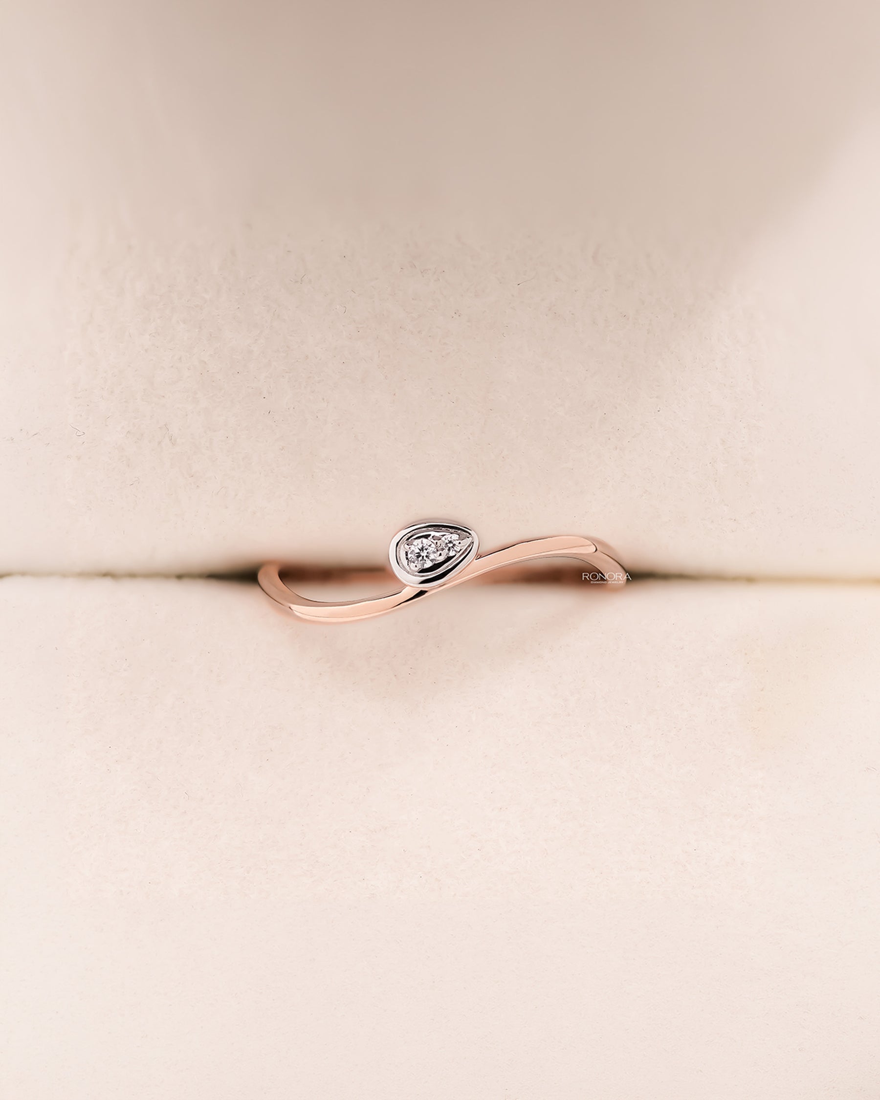 Angled view of round lab grown diamond solitaire ring with solitaire setting