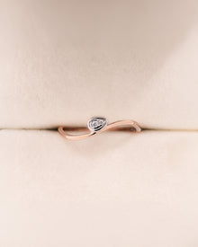 Angled view of round lab grown diamond solitaire ring with solitaire setting