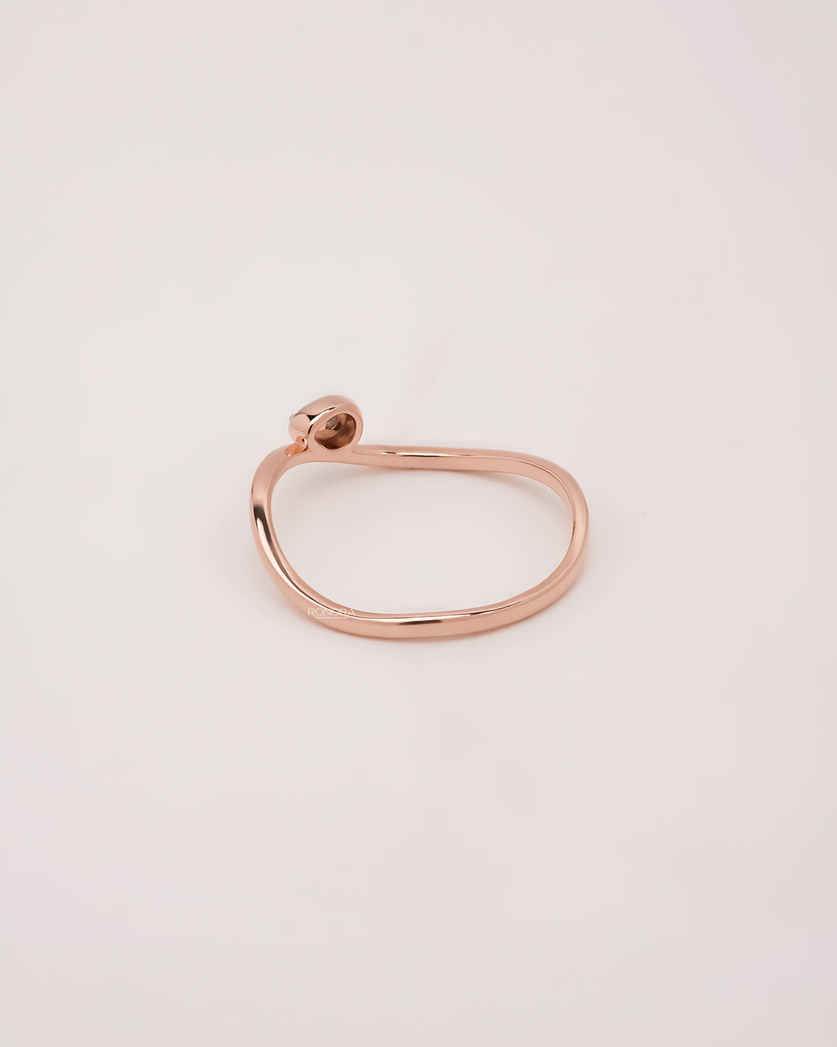 Back view of round lab grown diamond solitaire ring showing band detail