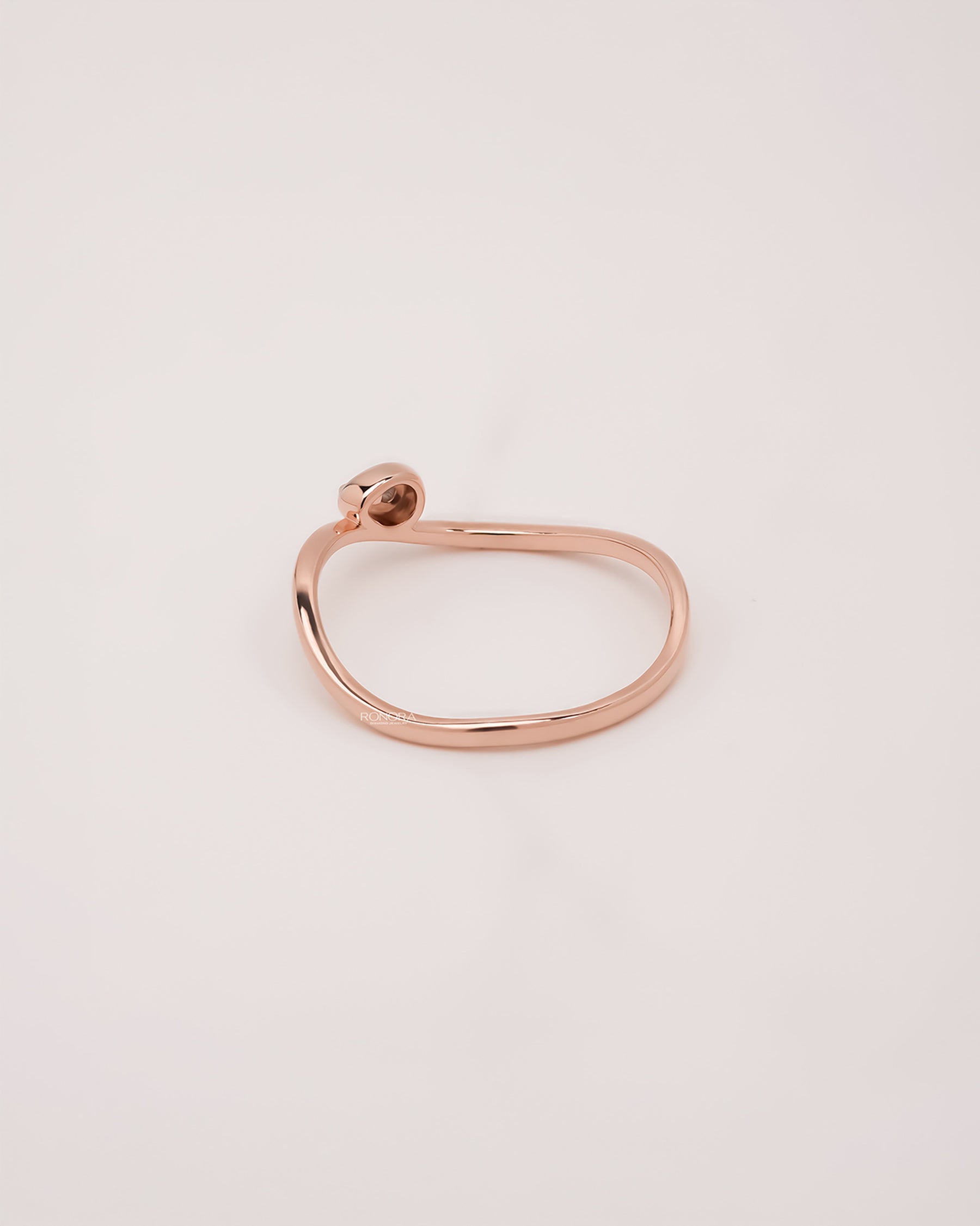 Back view of round lab grown diamond solitaire ring showing band detail