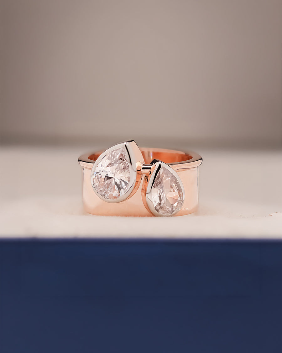 Odessa pear lab grown diamond bypass ring in rose gold inside Ronora box