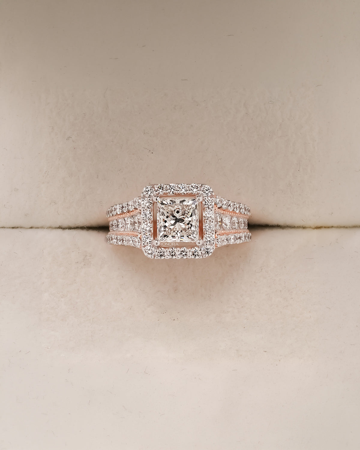 Genevieve princess lab grown diamond halo ring in rose gold inside Ronora box