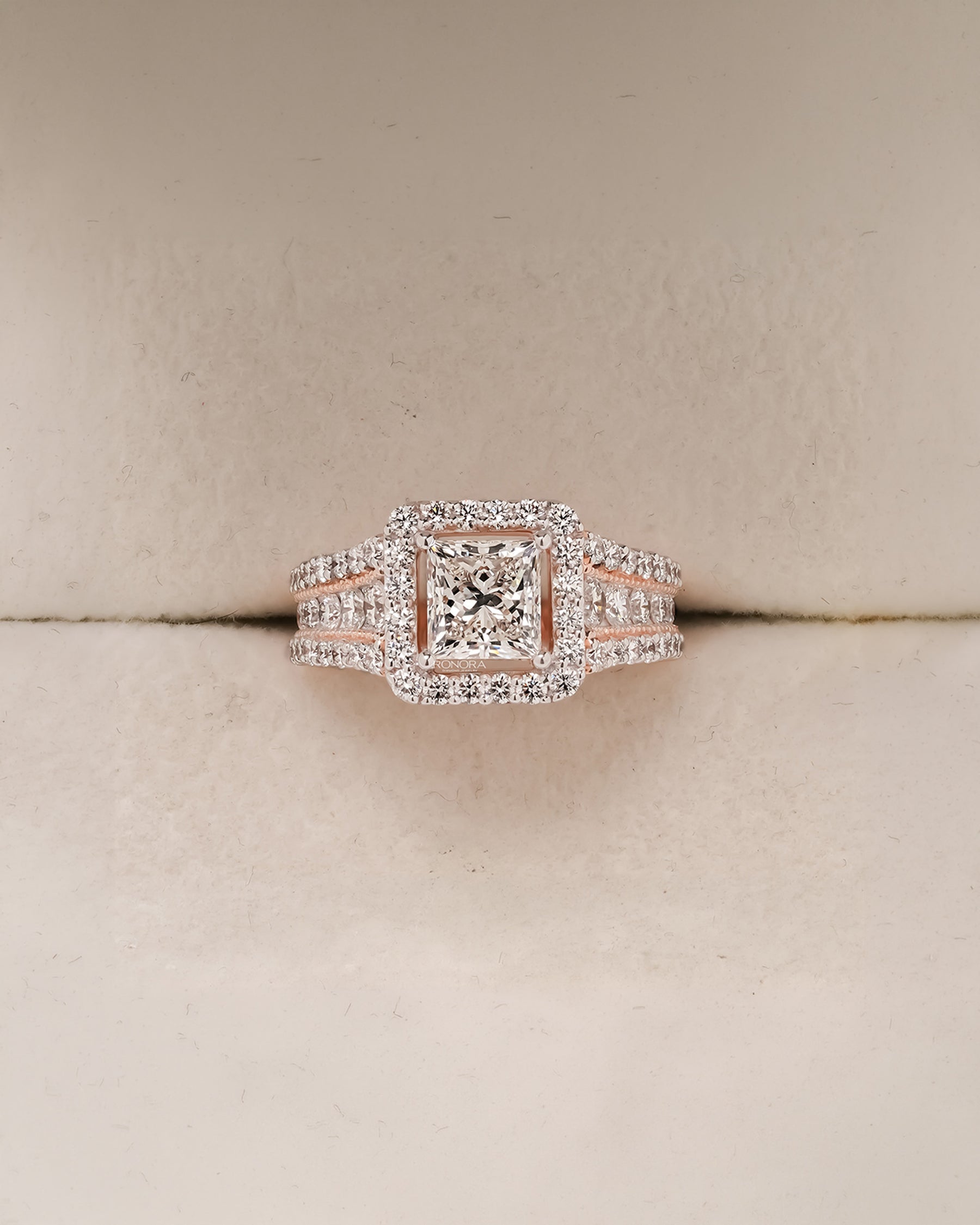 Genevieve princess lab grown diamond halo ring in rose gold inside Ronora box