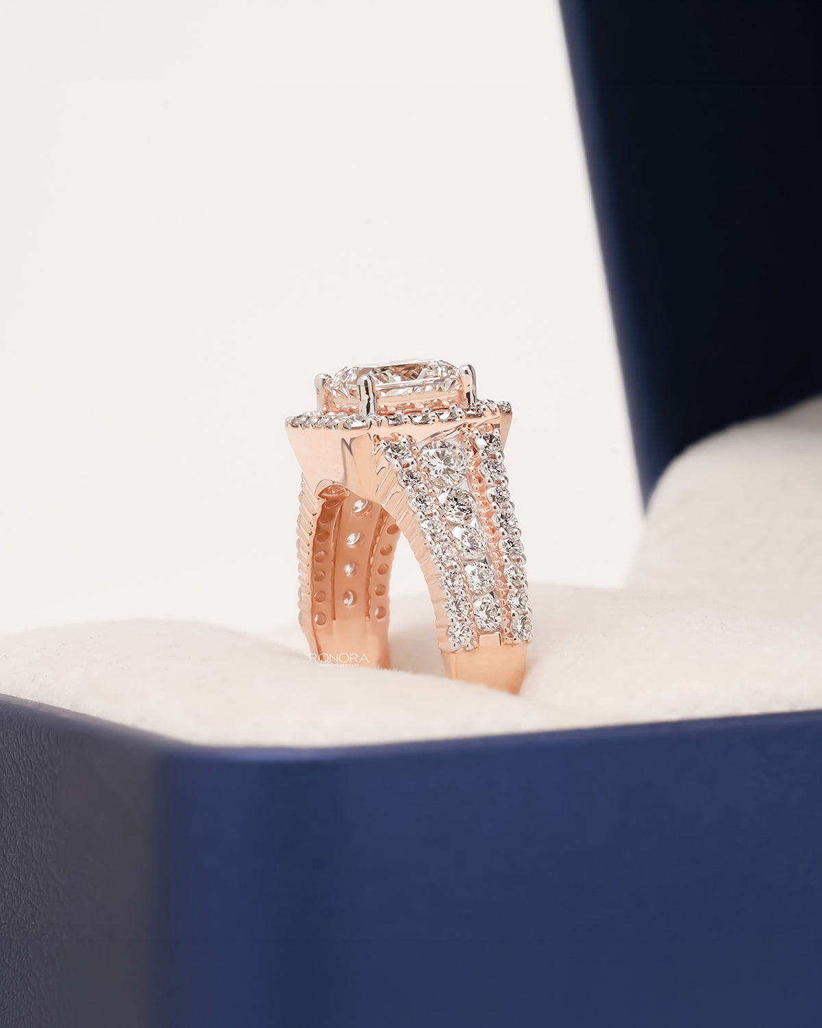 Side profile of princess lab grown diamond halo ring showing ring setting
