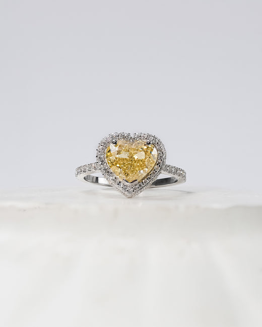 Aurielle yellow heart lab grown diamond halo ring in white gold inside Ronora box