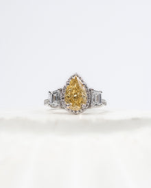 Marisol yellow pear lab grown diamond halo ring in white gold inside Ronora box