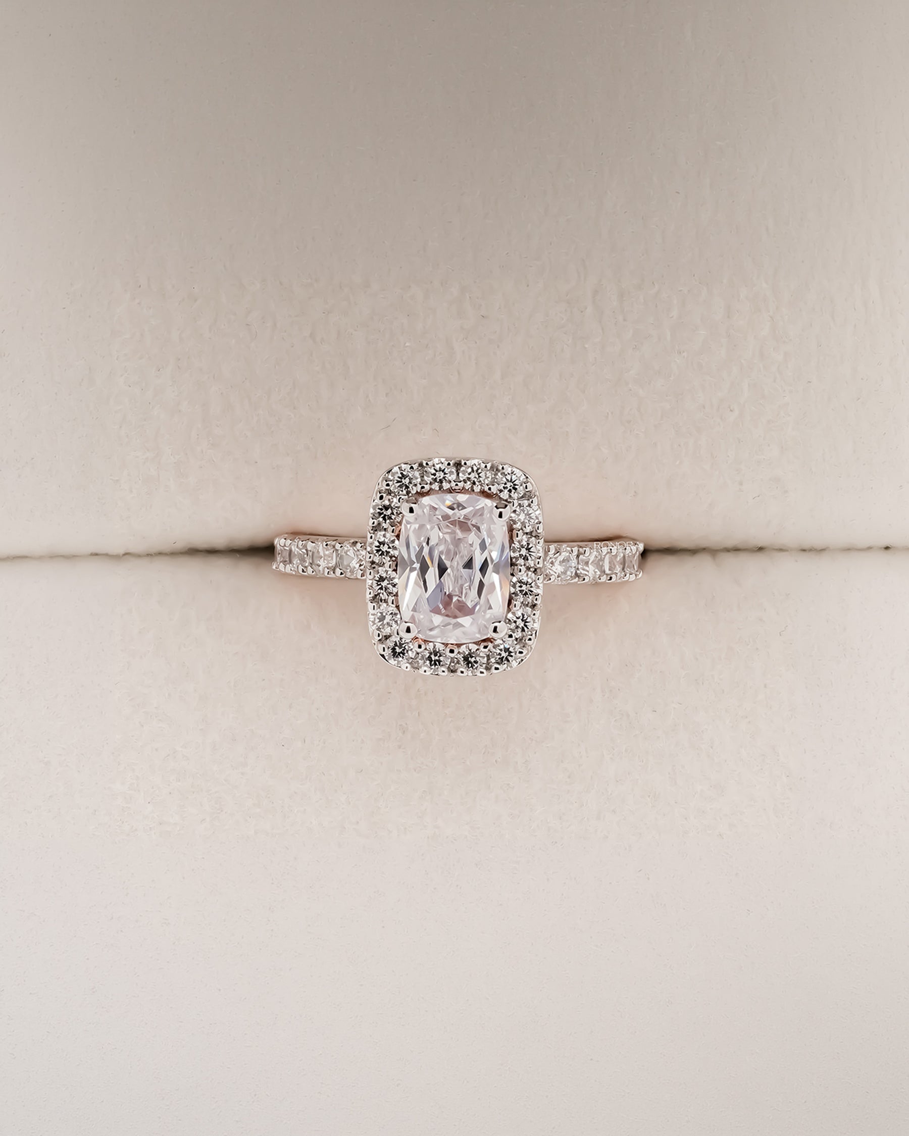 Celina cushion moissanite halo ring in rose gold inside Ronora box