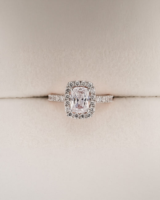 Celina cushion moissanite halo ring in rose gold inside Ronora box