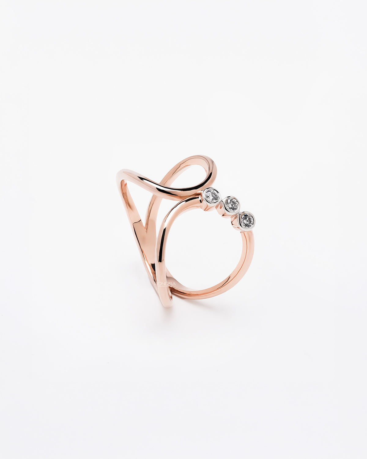 Side profile of open lab grown diamond swirl ring showing open accent setting