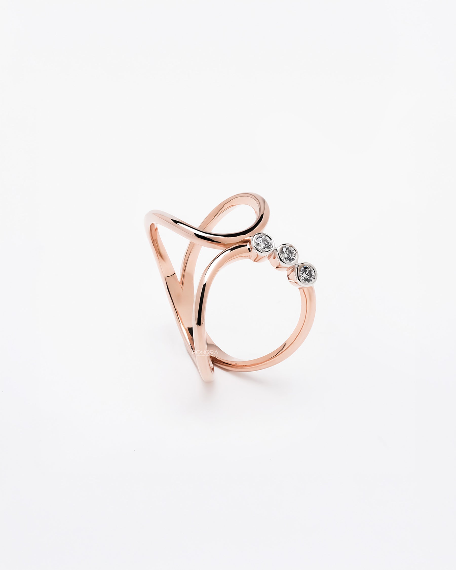 Side profile of open lab grown diamond swirl ring showing open accent setting