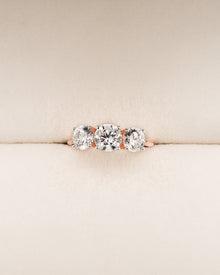 Madeleine round lab grown diamond three-stone ring in rose gold inside Ronora box