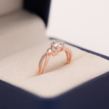 Angled view of round lab grown diamond bypass ring with pave bypass setting