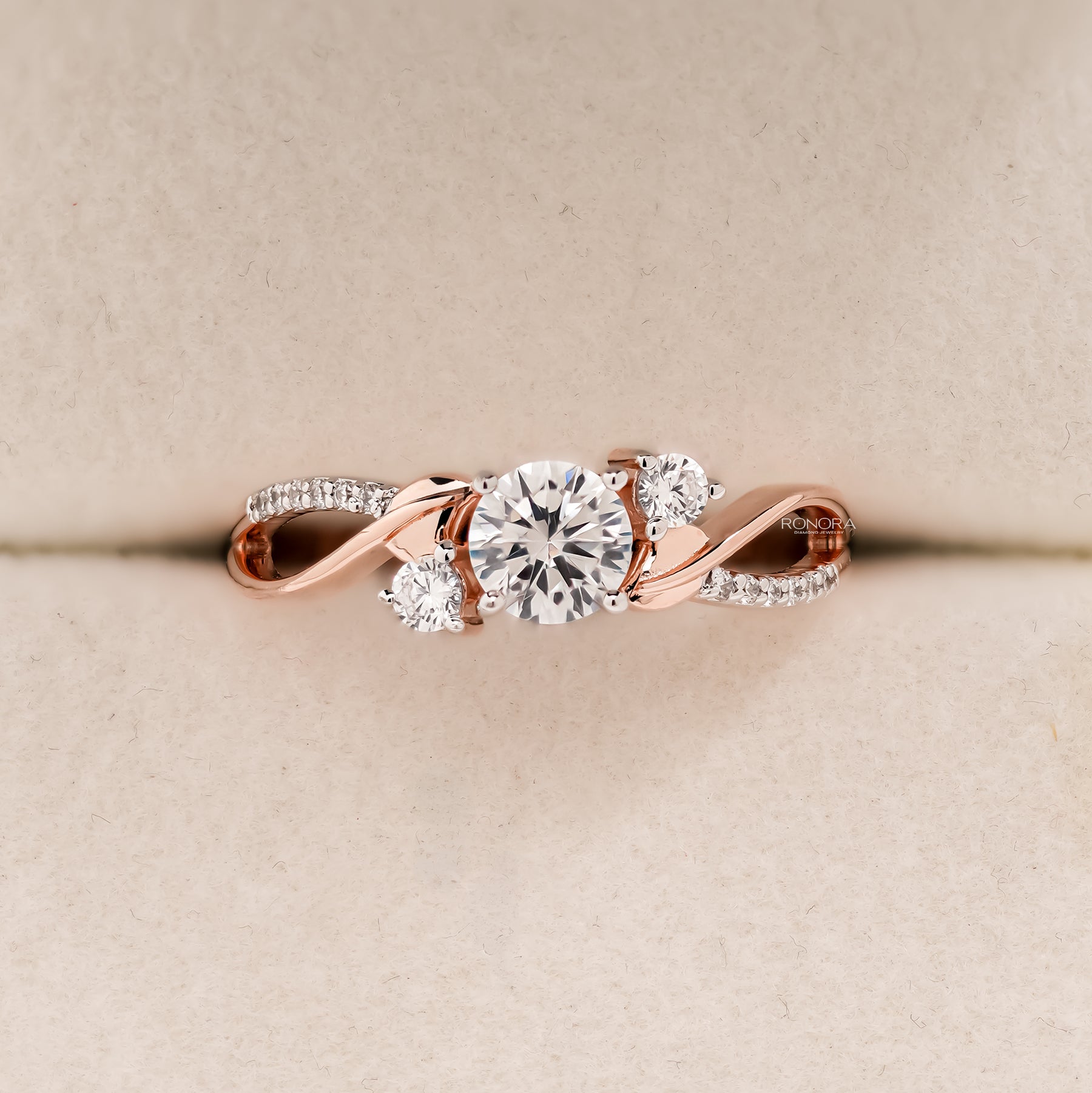 Eloise round lab grown diamond bypass ring in rose gold inside Ronora box